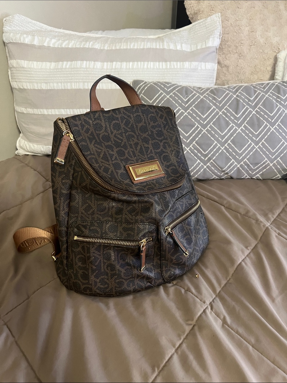Calvin Klein Brown Monogram Backpack with Gold Hardware